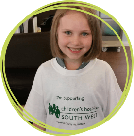 Chloe wearing her CHSW t shirt and new hair do with pride
